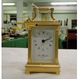 A brass cased carriage clock,