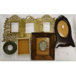 A burr maple miniature frame, ornate brass frames,