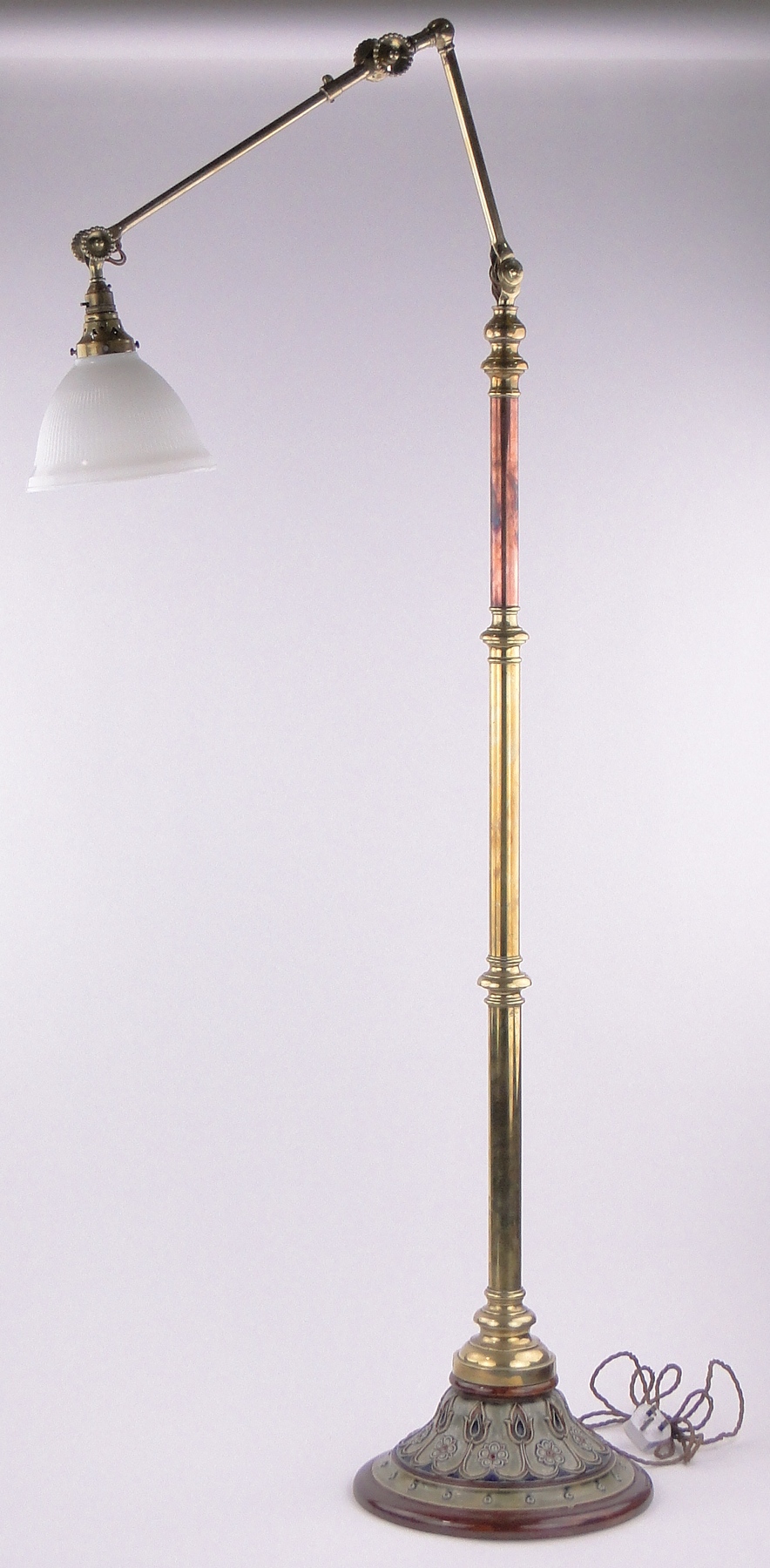 A Victorian floor standing Doulton Lambeth ceramic and brass standard lamp,