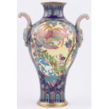 A continental porcelain vase circa 1900, with enamelled and gilded bird of paradise designs,