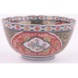 A Chinese Imari porcelain bowl, with painted and gilded panels, 6 character mark under, diameter 7",