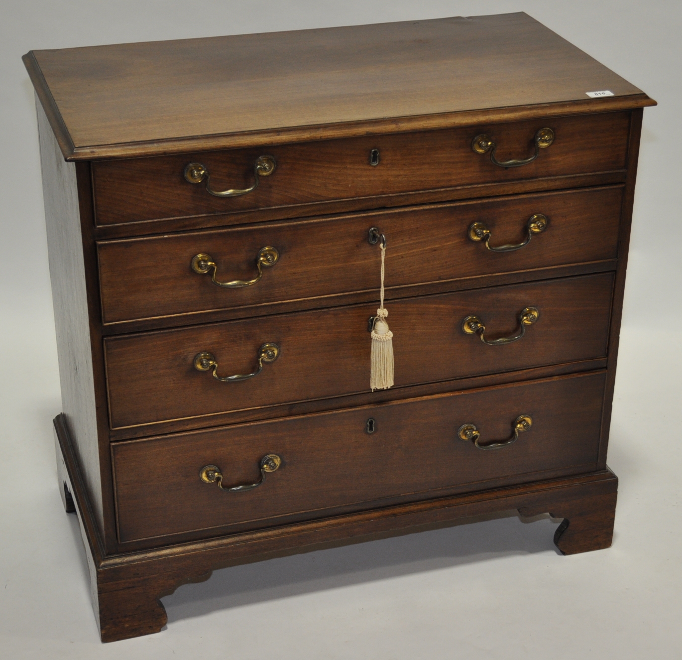 A George III mahogany chest of 4 long drawers, on bracket feet, width 2'10", height 2'9",