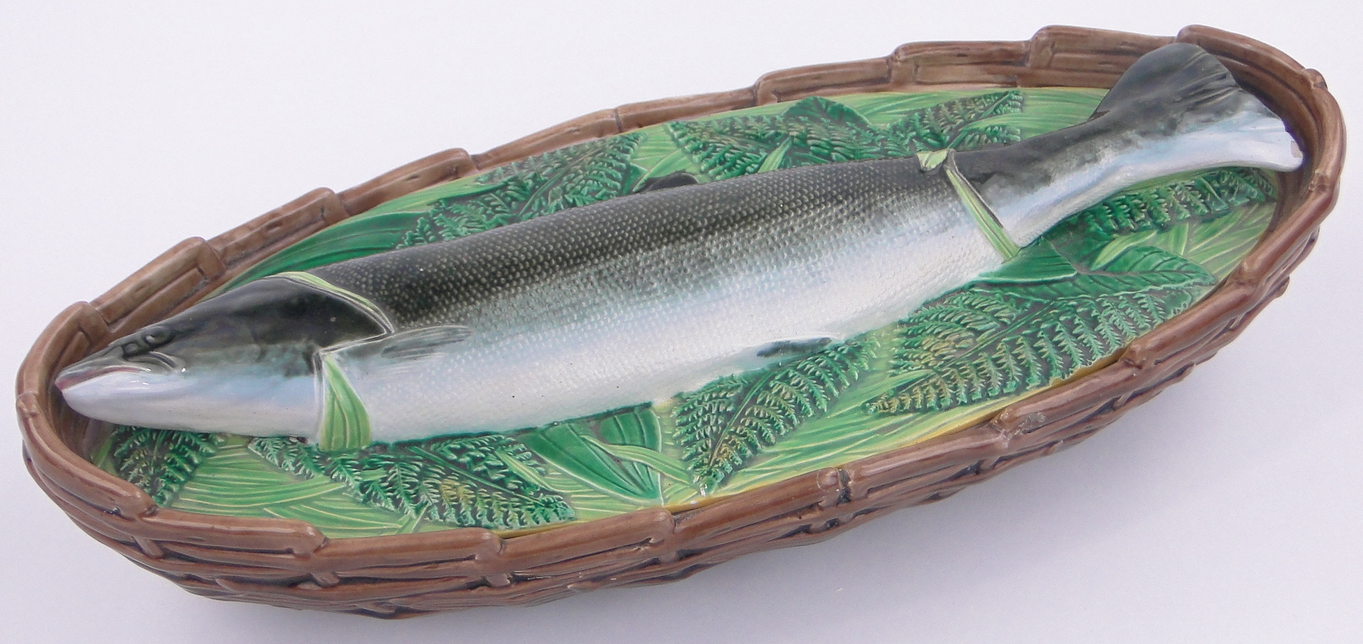 A Victorian George Jones Majolica salmon tureen and cover,