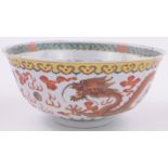 A Chinese Famille Vert porcelain bowl, with painted dragon designs, 6 character mark under,