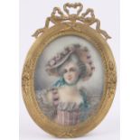 A miniature watercolour portrait on ivory of a young woman wearing a floral trimmed bonnet,