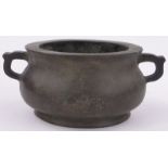A heavy Chinese circular bronze censer of bulbous form, impressed 6 character seal mark under base,