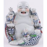 A large Chinese glazed porcelain seated Buddha with 5 children, impressed seal mark under,