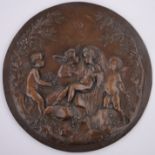 A relief embossed copper plaque circa 1900, decorated with cherubs in woodland signed Mme.