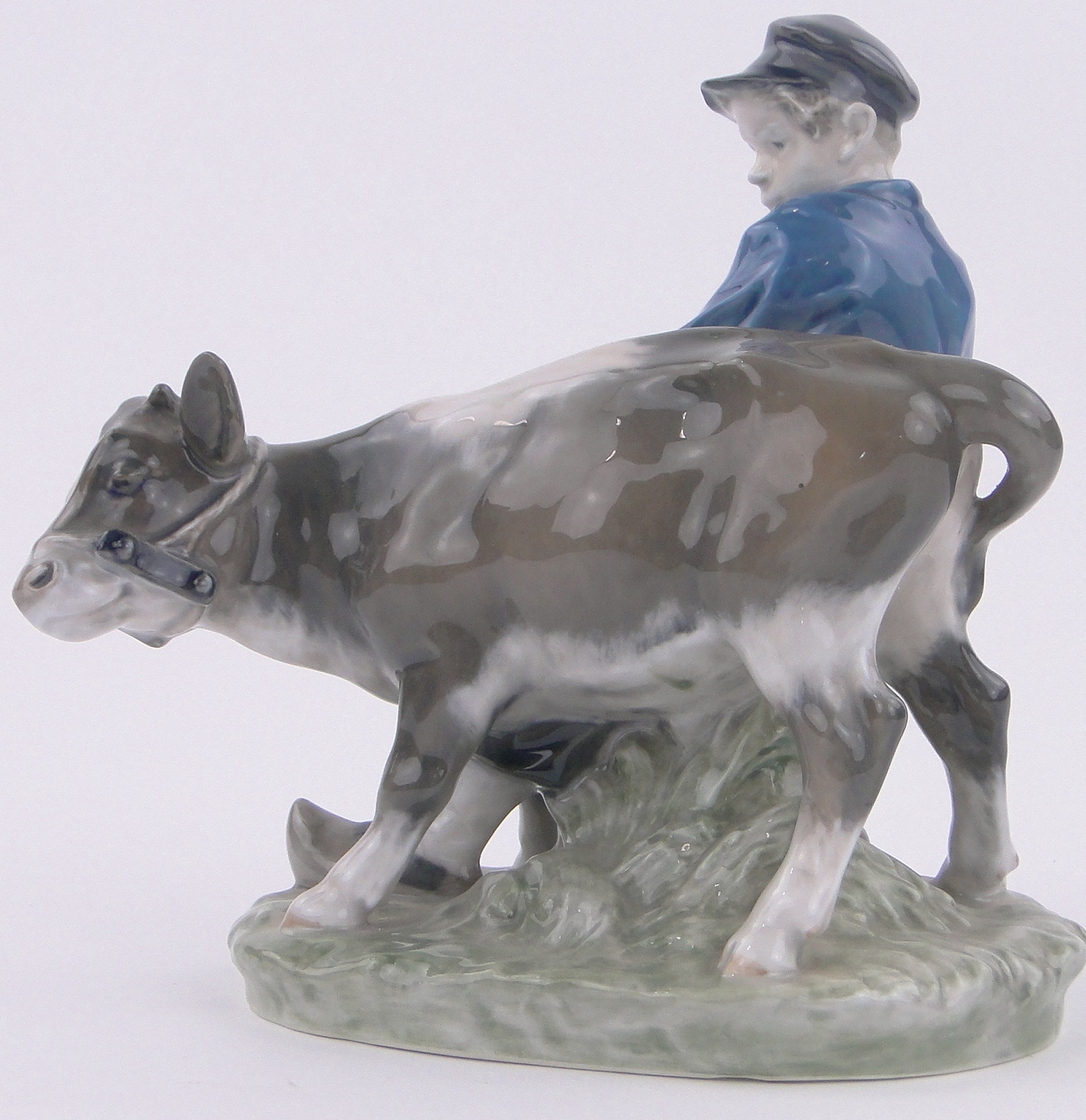 A Royal Copenhagen porcelain boy with calf, height 6.5". - Image 2 of 3