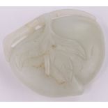 A Chinese relief carved jade fruit, length 2".