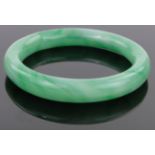 A Chinese green jade bangle, inside diameter 2.75".