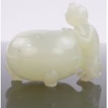 A Chinese pale green jade rouge pot with cat mount, height 1.75".