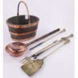 A metal bound wood coal bucket, various brass fire tools, etc.