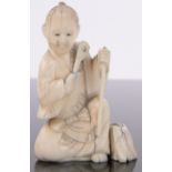 A Chinese carved ivory okimono, height 2.8".