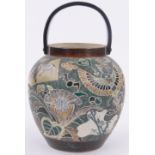 A Japanese ceramic biscuit barrel circa 1900, decorated with exotic birds, signed under base,