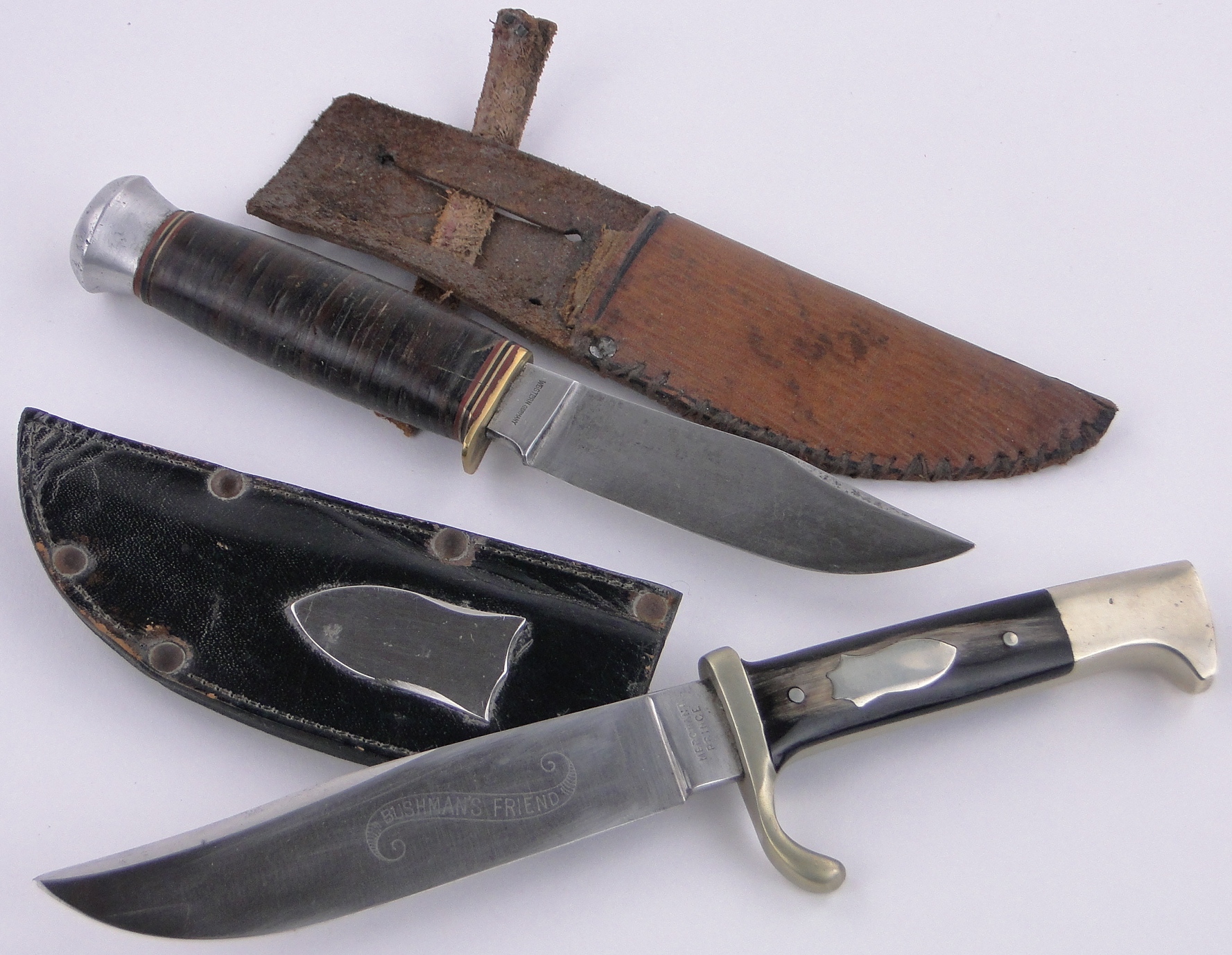 A 20th century Bowie knife, the Bushman's Friend, blade inscribed "Merchant Prince",