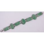 A Chinese carved and pierced jade 7 panel bracelet, length 6".