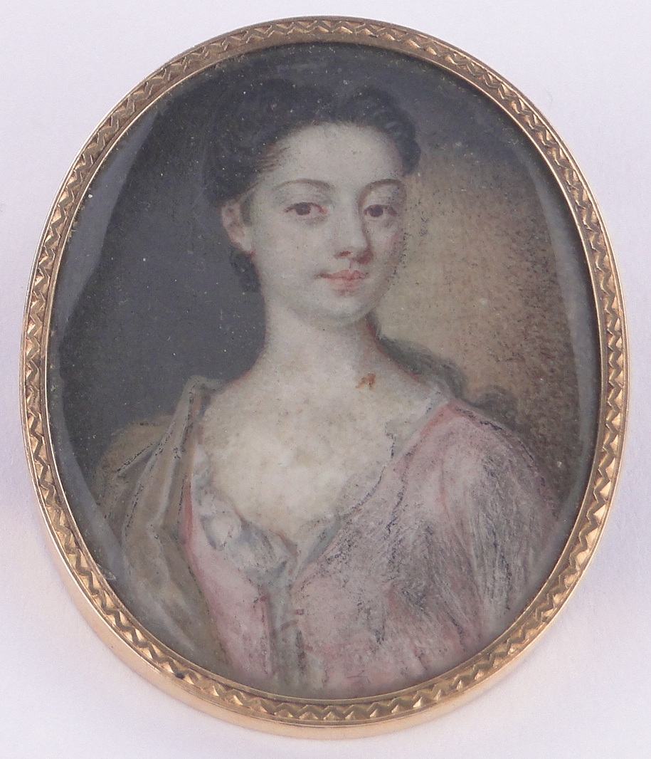 An early 19th century miniature watercolour on ivory, portrait of a young woman, unsigned,
