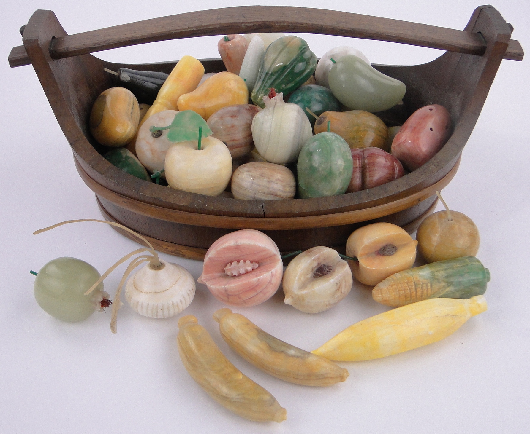 A large Collection of carved coloured stone ornamental fruit in wooden bound Scandinavian style - Image 2 of 3