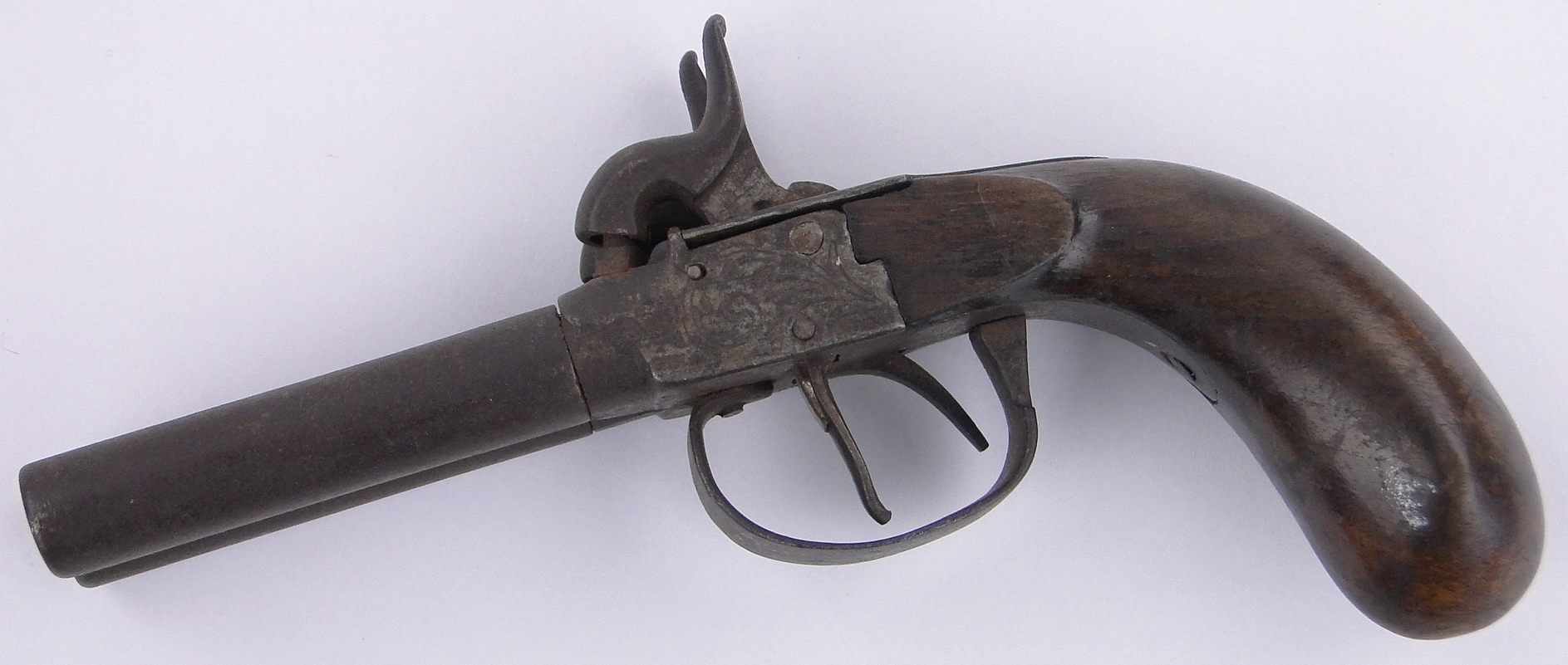 An early 19th century double barrel percussion pistol,