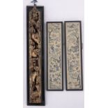 A Chinese relief carved and gilded wood wall panel, depicting horses in a landscape,
