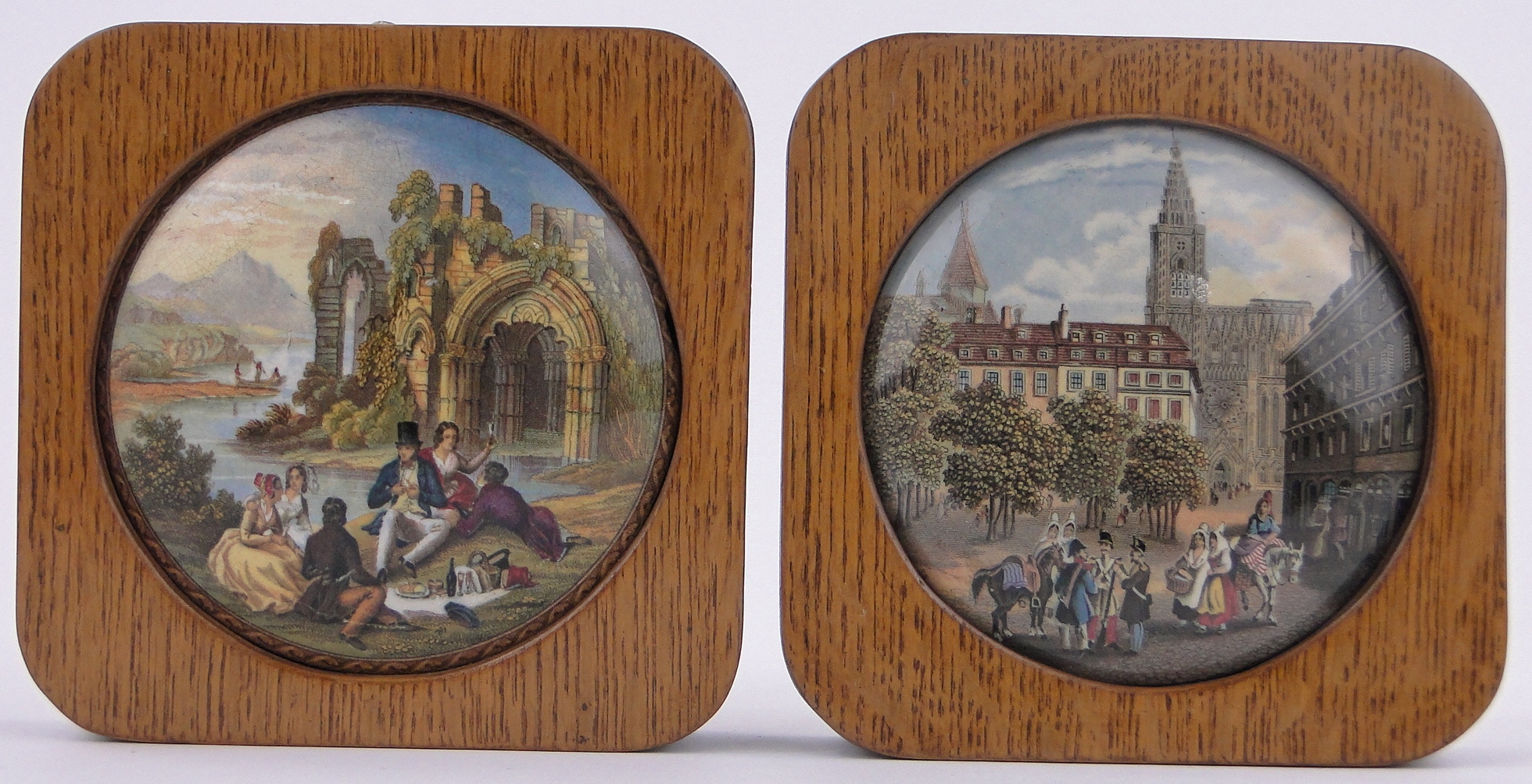 2 19th century colour transfer printed pot lids, 4.5" across, oak framed.