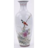 A Chinese Famille Vert porcelain vase, with painted bird and blossom design,