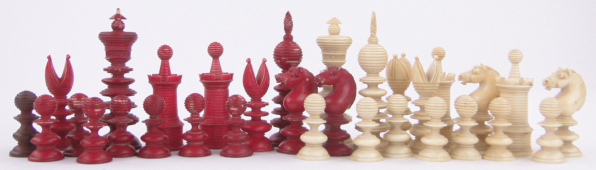 A Victorian red and white stained ivory chess set, King height 3.25", 1 pawn replaced.