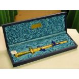 A Presentation knife and scabbard with plaque to Rear Admiral Hotma Harahap,