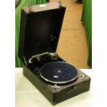 A Columbia wind-up portable gramophone with chrome mounts.