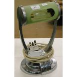 An Art Deco chrome and green glass adjustable table lamp.