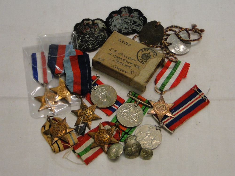 Second World War medals, Regimental badges, Dogtag and buttons.