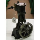 A cast-iron and brass stationary engine.