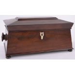 A 19th century figured mahogany sarcophagus shaped tea caddy, with fitted inner caddies, length 14".