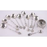 A set of 9 Japanese silver spoons, marked 950 and an Indian Kutch white metal salt and spoon.