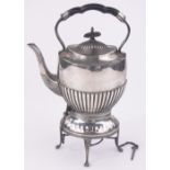 A Victorian electroplate tea kettle on stand.