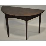 A Georgian mahogany D shaped side table, raised on square tapered legs, width 4', depth 1'10",