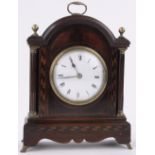 An Edwardian mahogany cased domed top mantel clock, with parquetry inlay and brass mounts,