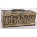 A relief cast Gothic style brass casket, early 20th century, length 8.5".