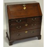 A Georgian mahogany bureau, with fitted interior,