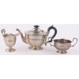 A 3-piece silver teaset of circular form, makers marks G & S Ltd., 35.7 oz total.