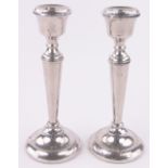 A pair of silver candlesticks, Birmingham 1969, height 21cm.