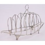 A George III silver toast rack, London 1801, length 24cm.