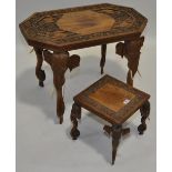 2 Indian rosewood occasional tables, with carved tops raised on elephant carved legs,