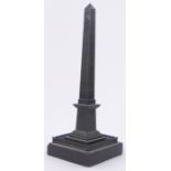 A 19th century bronze obelisk, commemorating the Luxor obelisk moved to Paris in 1836,