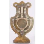 An ornate coloured marble gilt metal and enamel lyre shaped pocket watch stand, height 6".