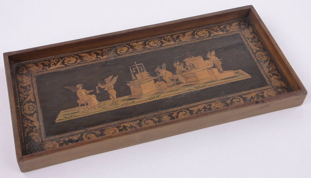 A 19th century Italian marquetry inlaid tray, depicting a classical forge,