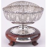 A large Mappin & Webb silver rose bowl on stand, with cast shell border,