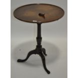 A George III oak tilt top tripod table, width 1'10", height 2'3".