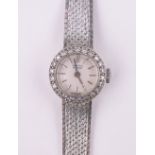 A lady's Vertex Revue 9ct white gold cased cocktail wristwatch, with diamond set bezel, serial no.